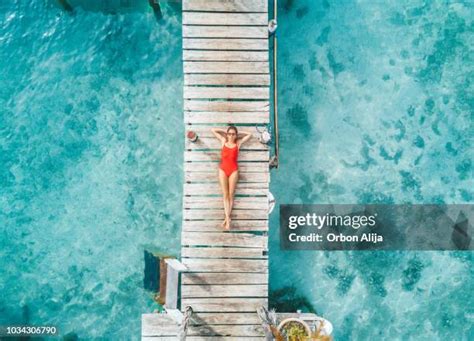 218,831 Woman In Swimsuits Stock Photos & High